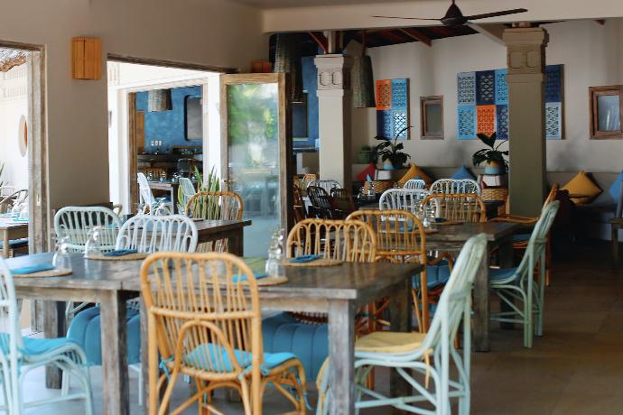 brown wooden table with chairs